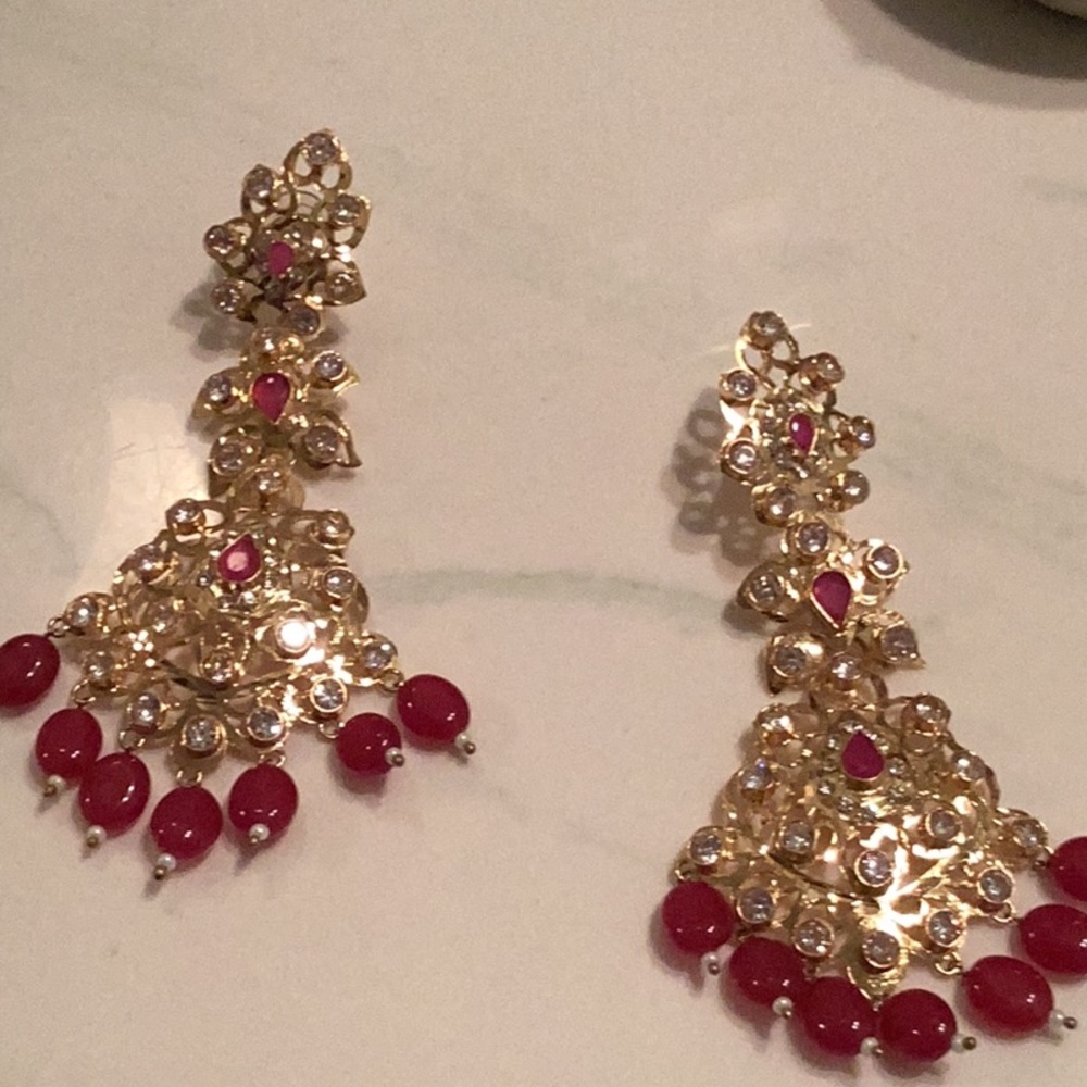Beautiful earring with ruby and zircon